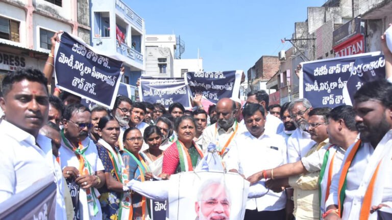 Nirmala Jaggareddy burnt an effigy of Narendra Modi in protest against central government policies.